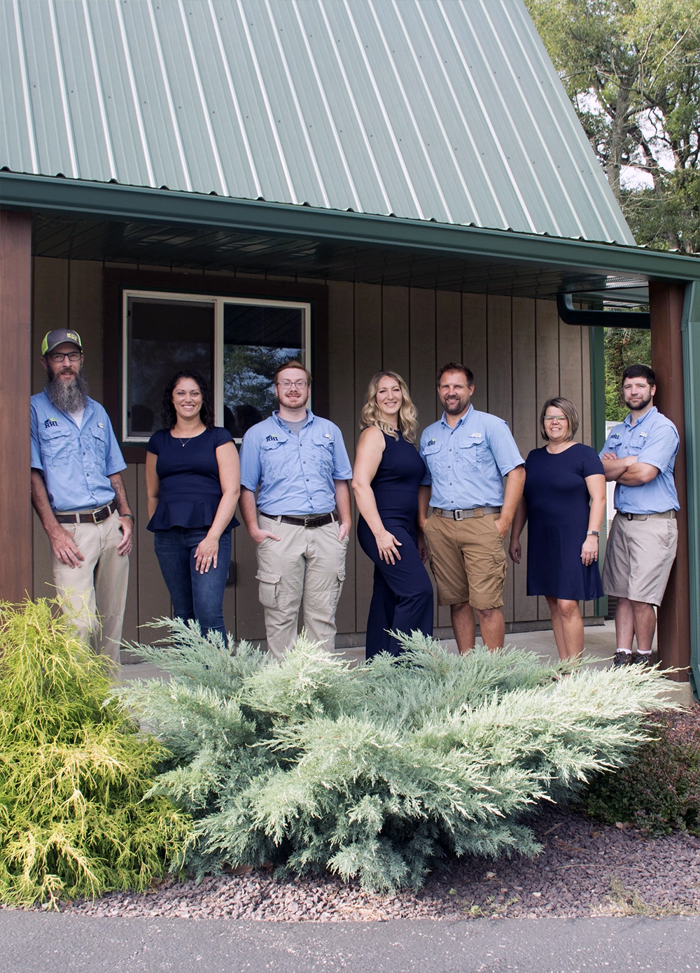 RHI Home Inspectors of Evansville Indiana Standing on a Porch